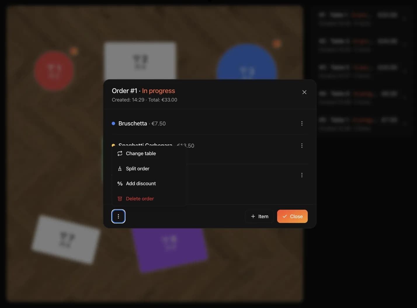 Tablet with an open order: dish list and order actions — change table, split order, add discount